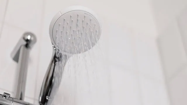 Newly remodeled bathroom with elegant lighting and spacious vanity