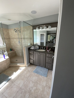 Modern bathroom remodel with elegant tile and walk-in shower in Vicksburg, MI