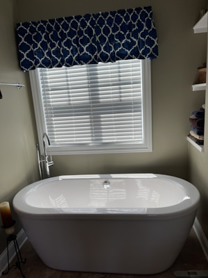 Elegant bathroom vanity upgrade with stylish lighting and mirrors