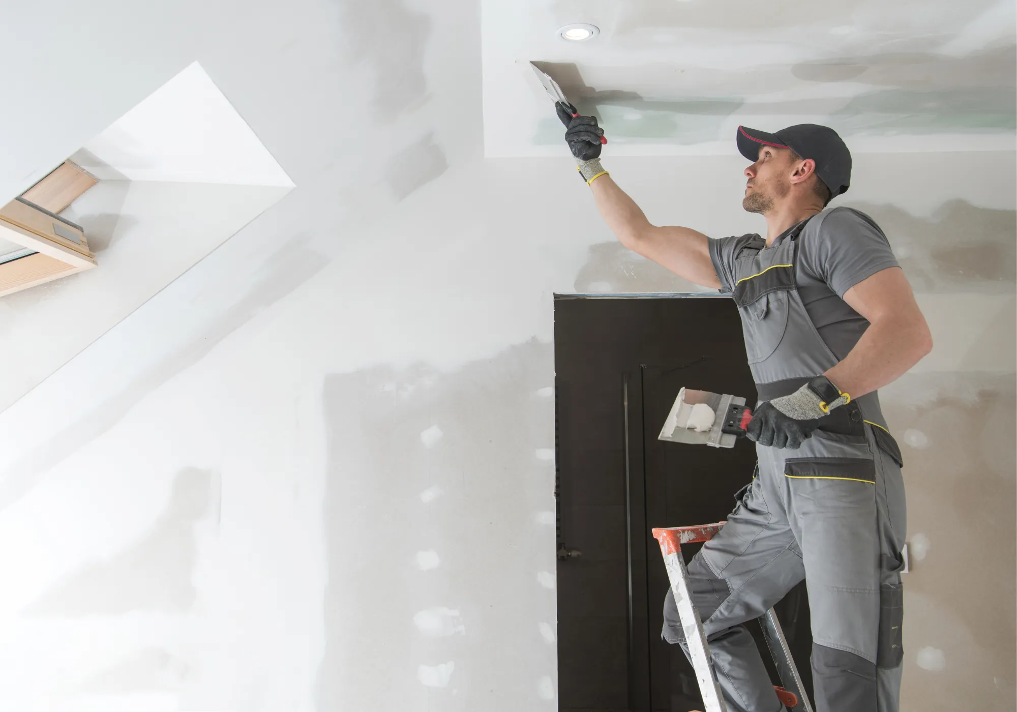 Expert installing new tiles during a bathroom remodel